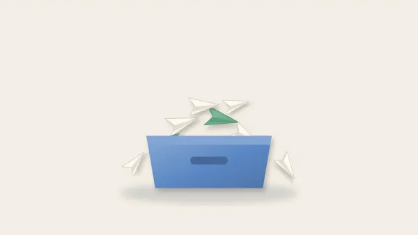 Letter tray overflowing with paper planes